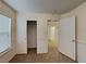 Cozy bedroom with a closet and natural light, freshly painted and carpeted at 209 Copper Pine Ave, North Las Vegas, NV 89031
