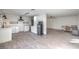Modern kitchen featuring white cabinetry and new appliances perfect for cooking and entertaining guests at 210 E Longacres Dr, Henderson, NV 89015
