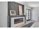 This main bedroom features a fireplace and private access to the outdoors at 210 E Longacres Dr, Henderson, NV 89015
