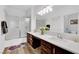Modern bathroom with dual sinks, spacious countertop, and framed mirror at 2325 Windmill Pkwy # 1023, Henderson, NV 89074