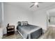 Inviting bedroom featuring comfortable bed, ceiling fan, and access to ensuite bathroom at 2325 Windmill Pkwy # 1023, Henderson, NV 89074