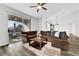 Inviting living room boasts natural light, hardwood flooring, and an open concept layout at 2325 Windmill Pkwy # 1023, Henderson, NV 89074