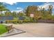 Community basketball court featuring a green space, perfect for families at 2345 Villandry Ct, Henderson, NV 89074