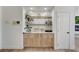 A built-in cabinet with decor and marble countertop provides functional space at 2345 Villandry Ct, Henderson, NV 89074