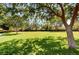 Expansive green space in a community with mature trees providing ample shade at 2345 Villandry Ct, Henderson, NV 89074