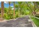 Beautifully landscaped community street with mature trees providing a serene setting at 2345 Villandry Ct, Henderson, NV 89074