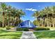 Beautiful water fountain surrounded by lush landscaping, with palm trees at 2345 Villandry Ct, Henderson, NV 89074