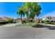 Charming front yard with mature trees, well-manicured lawn and attractive curb appeal at 2345 Villandry Ct, Henderson, NV 89074