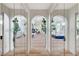 Hallway view featuring modern archways looking into the main bedroom at 2345 Villandry Ct, Henderson, NV 89074