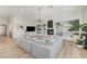 Living room featuring contemporary decor, a fireplace, built-in shelving, and ample natural light at 2345 Villandry Ct, Henderson, NV 89074
