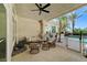 Covered patio area that overlooks the backyard pool and has nice seating options at 2345 Villandry Ct, Henderson, NV 89074