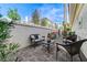 Cozy outdoor patio with seating, perfect for relaxing and enjoying the serene backyard ambiance at 2345 Villandry Ct, Henderson, NV 89074