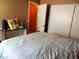 Cozy bedroom features neutral tones, closet, and a bright ensuite bathroom at 2349 Cardiff Ln # B, Las Vegas, NV 89108