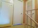 Hallway featuring closet and access to upper level at 2349 Cardiff Ln # B, Las Vegas, NV 89108