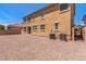 Spacious backyard features a rock surface and brick wall at 2521 Cattrack Ave, North Las Vegas, NV 89081