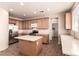 Spacious kitchen featuring stainless steel appliances, ample cabinet space, and an island at 2521 Cattrack Ave, North Las Vegas, NV 89081