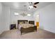 Spacious bedroom featuring a ceiling fan, ambient lighting and stylish furnishings at 2851 Glistening Grove Ave, Henderson, NV 89052
