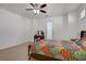 Inviting bedroom with a large bed, natural light and a vanity at 2851 Glistening Grove Ave, Henderson, NV 89052