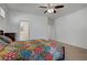 Bright bedroom with plush carpet and view to the bathroom at 2851 Glistening Grove Ave, Henderson, NV 89052