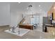 Well-designed kitchen with a large island, modern appliances, and adjacent dining area at 2851 Glistening Grove Ave, Henderson, NV 89052