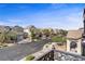 Charming street view featuring houses with lush landscaping and mature trees at 2851 Glistening Grove Ave, Henderson, NV 89052