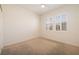 Bedroom with neutral carpet, plantation shutters and ample natural light at 3071 Lake Barkley Rd, Henderson, NV 89052