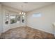 Dining area featuring large windows and tile flooring at 3071 Lake Barkley Rd, Henderson, NV 89052
