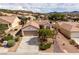 Charming single-story home featuring desert landscaping, a two-car garage, and tile roofing at 3071 Lake Barkley Rd, Henderson, NV 89052
