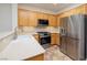 Kitchen featuring stainless steel appliances and light wood cabinetry at 3071 Lake Barkley Rd, Henderson, NV 89052