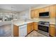 Kitchen with stainless steel appliances and adjacent dining area at 3071 Lake Barkley Rd, Henderson, NV 89052