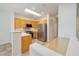 Bright kitchen with light wood cabinets, stainless steel appliances, and a skylight at 3071 Lake Barkley Rd, Henderson, NV 89052