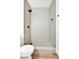 Updated bathroom with a tiled walk-in shower featuring a rainfall showerhead at 3318 N Decatur Blvd # 1107, Las Vegas, NV 89130