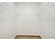 Walk-in closet with wire shelving and wood-look flooring at 3318 N Decatur Blvd # 1107, Las Vegas, NV 89130