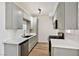 Charming kitchen with grey cabinets, sleek countertops, and stainless steel appliances at 3318 N Decatur Blvd # 1107, Las Vegas, NV 89130