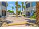 Image features the leasing office with well-maintained landscaping and palm trees, enhancing curb appeal at 3318 N Decatur Blvd # 1107, Las Vegas, NV 89130