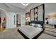 Spacious bedroom featuring a padded headboard, mirrored bedside tables, and modern decor at 360 E Desert Inn Rd # 1803, Las Vegas, NV 89109