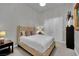 Cozy bedroom featuring a tufted headboard, neutral tones, and ample closet space at 360 E Desert Inn Rd # 1803, Las Vegas, NV 89109