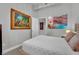 Tastefully decorated bedroom with a cozy bed and unique artwork at 360 E Desert Inn Rd # 1803, Las Vegas, NV 89109