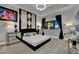 Luxurious bedroom with a padded headboard, modern decor, and views of the city skyline at 360 E Desert Inn Rd # 1803, Las Vegas, NV 89109