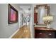 Long hallway featuring hardwood floors, recessed lighting, and elegant decor at 360 E Desert Inn Rd # 1803, Las Vegas, NV 89109