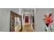 Hallway features hardwood floors, decorative mirrors, and elegant decor at 360 E Desert Inn Rd # 1803, Las Vegas, NV 89109
