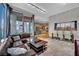 Stylish living room featuring a comfortable sofa, dining area, and modern kitchen, creating an inviting living space at 360 E Desert Inn Rd # 1803, Las Vegas, NV 89109