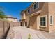 Spacious backyard featuring a concrete patio, low-maintenance landscaping, and privacy fencing at 3615 Dutchmans Vine Ct, North Las Vegas, NV 89081