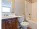 Bathroom featuring a stylish vanity, modern fixtures, and a shower-tub combination at 3615 Dutchmans Vine Ct, North Las Vegas, NV 89081