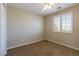 Bedroom featuring a ceiling fan, plush carpeting, a window with shutters and a closet for optimal functionality at 3615 Dutchmans Vine Ct, North Las Vegas, NV 89081