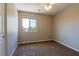 Inviting bedroom with plush carpeting, neutral walls and a window allowing natural light to illuminate the room at 3615 Dutchmans Vine Ct, North Las Vegas, NV 89081