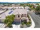 Aerial view of a suburban home with solar panels and a cozy front porch area at 3954 Crystal Trip Ct, Las Vegas, NV 89129