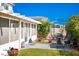 Well-maintained backyard featuring a covered patio, BBQ, gazebo and green lawn at 3954 Crystal Trip Ct, Las Vegas, NV 89129