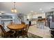 Open floorplan with dining room flowing into the kitchen area, perfect for entertaining guests at 3954 Crystal Trip Ct, Las Vegas, NV 89129
