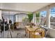 Enclosed sunroom offers a relaxing space with ample seating and natural light at 3954 Crystal Trip Ct, Las Vegas, NV 89129
